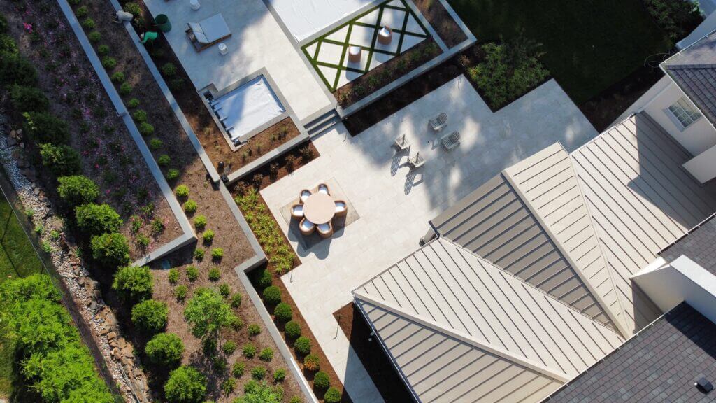 Overhead view of a pool area in a backyard landscape design by Landbox Landscape Architecture Studio