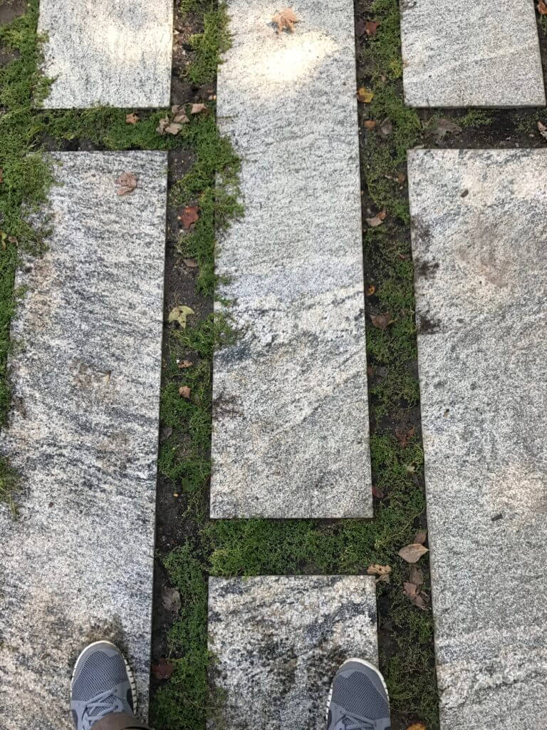 Inlaid stone & grass detail from a landscape design by Landbox Landscape Architecture Studio