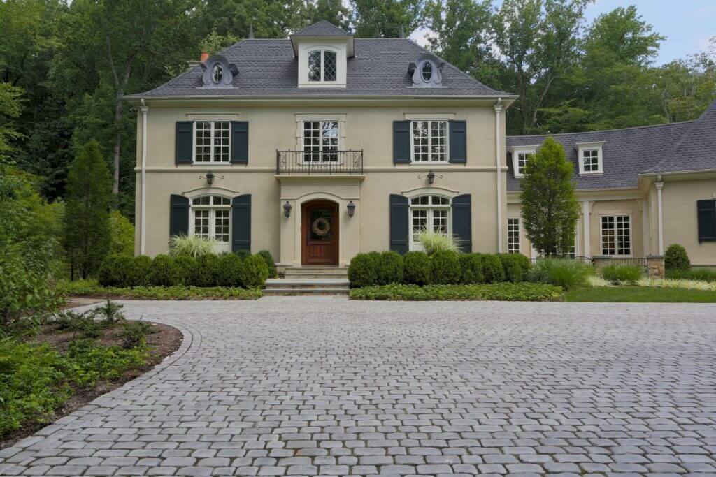 Paver driveway and home entrance designed by Landbox Landscape Architecture Studio